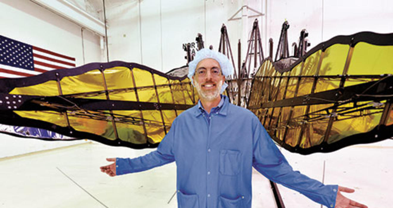 N. Jeremy Kasdin ’85 displays a prototype of starshade petals, built by interns from Princeton and MIT.