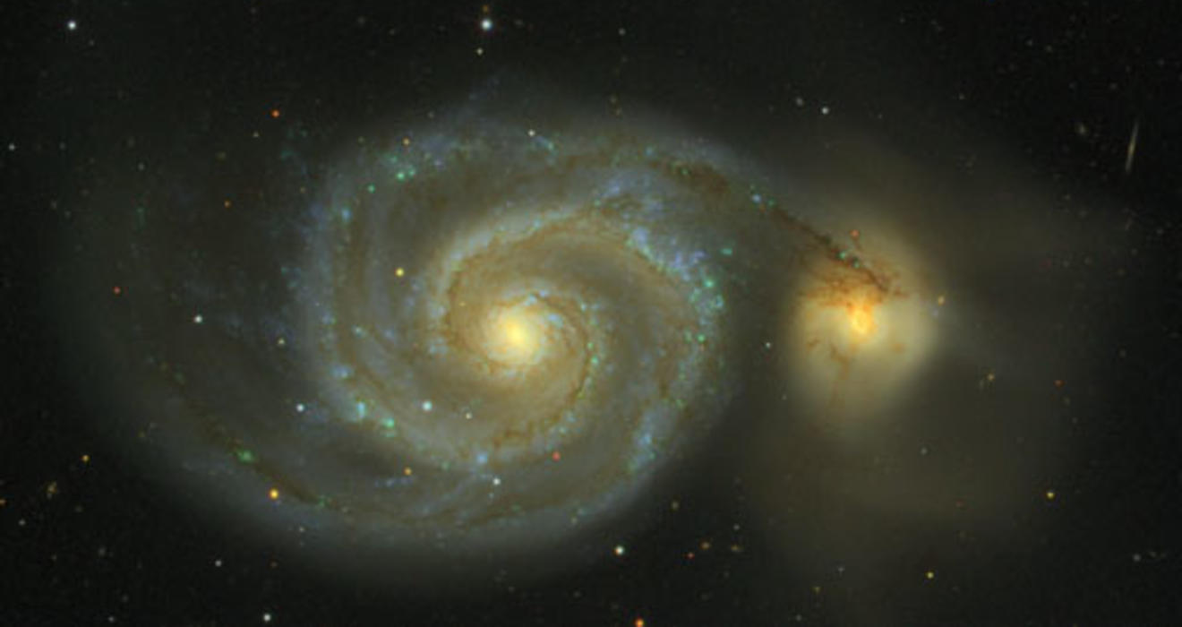 Messier 51, as observed in the Sloan Digital Sky Survey, is actually two galaxies in collision. The impact, which will take 100 million years to complete, creates the spiral arms and the spray of stars visible at the right. Known as the Whirlpool Galaxy, 