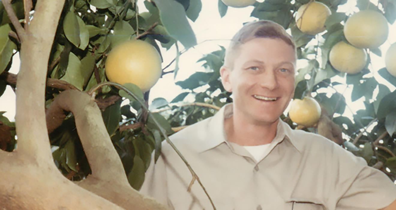Richard Shallberg ’54 in his citrus grove in Florida