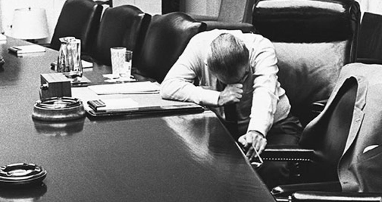 President Lyndon B. Johnson listens to a tape-recorded message from his son-in-law, Marine Capt. Charles Robb, who was in Vietnam, in 1968.