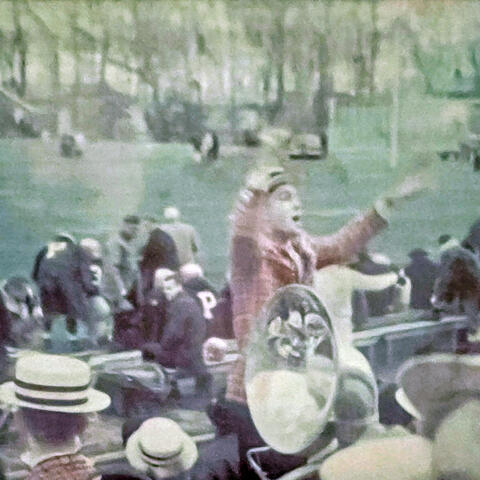A student conducts the band at a Princeton football game, circa 1962