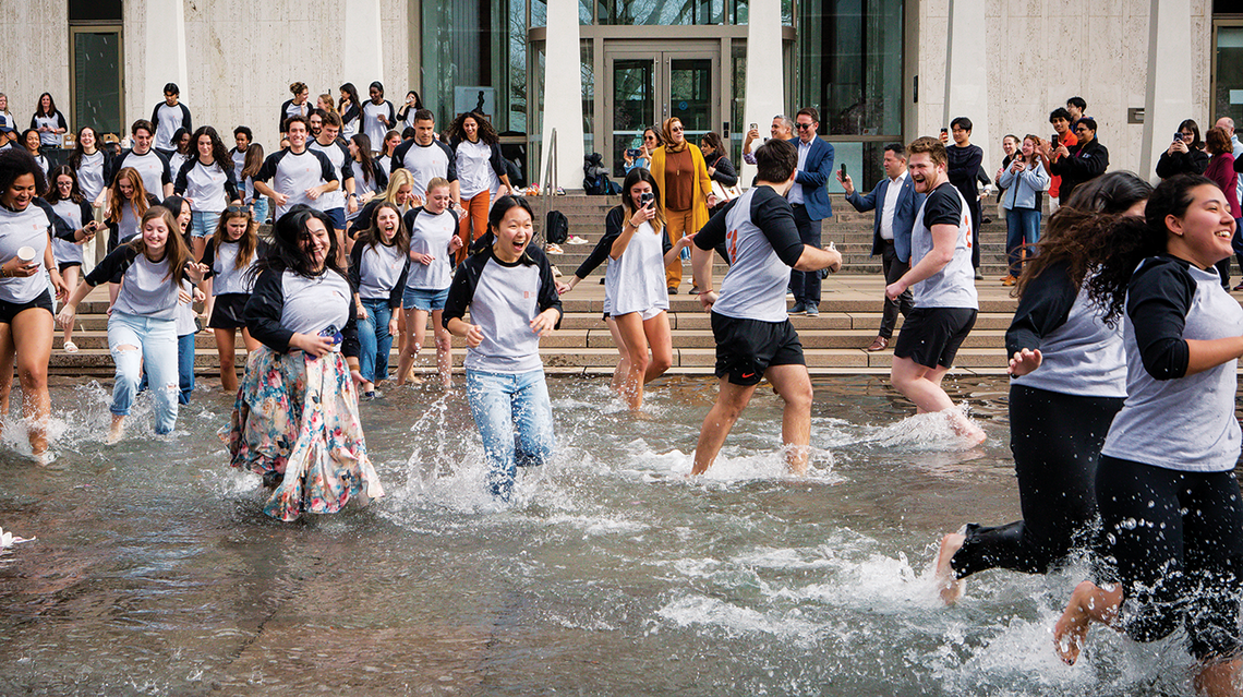 SPIA students celebrate in the Fountain of Freedom