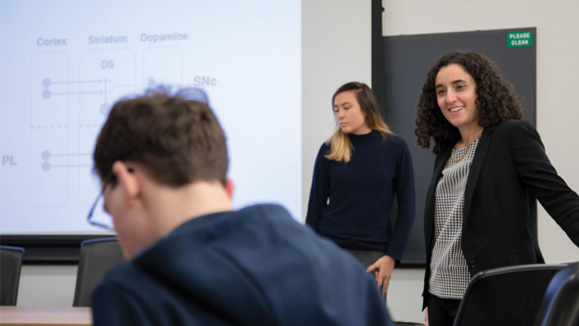 Neuroscience professor Ilana Witten speaks in class in front of students