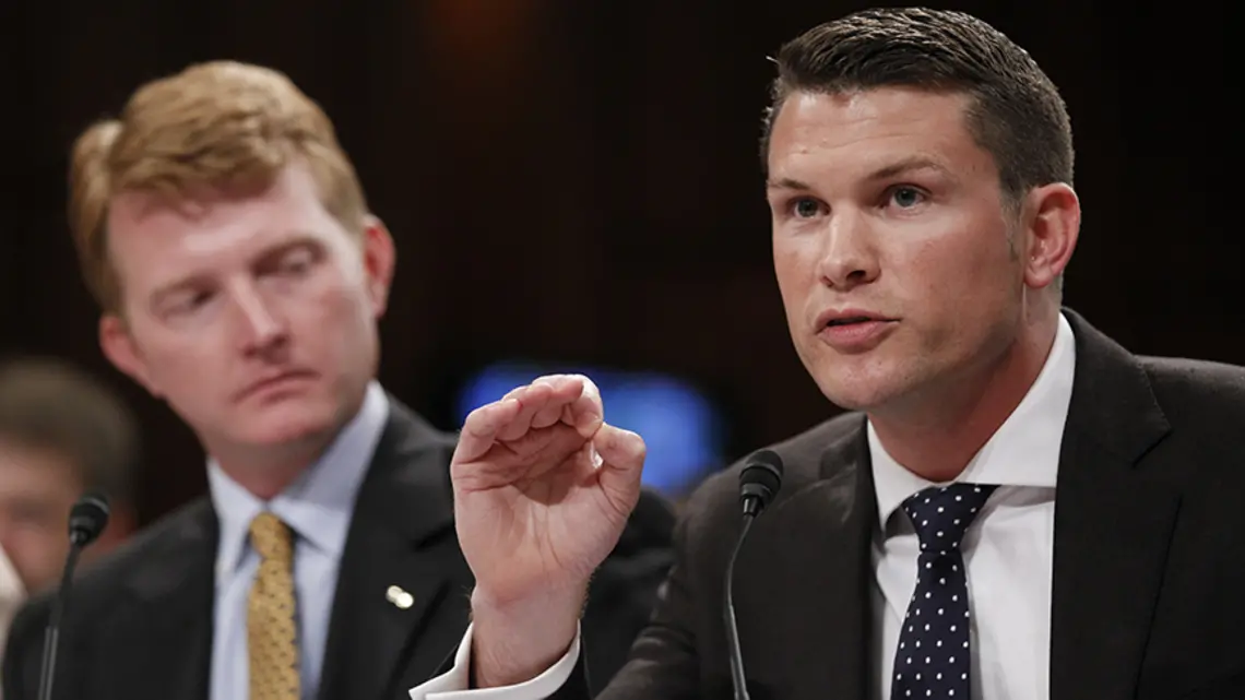 PeteHegseth2010_AP.jpg Pete Hegseth ’03, left, and another Army captain speak at a Senate Judiciary Committee hearing.