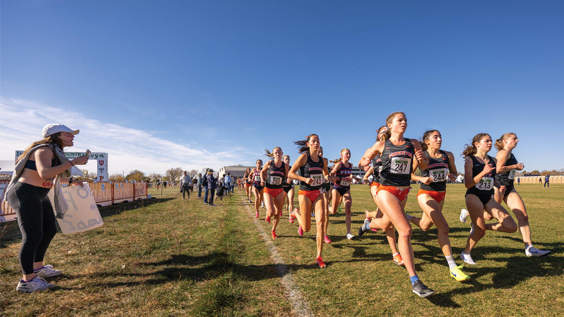 womens running cross country fans cheering