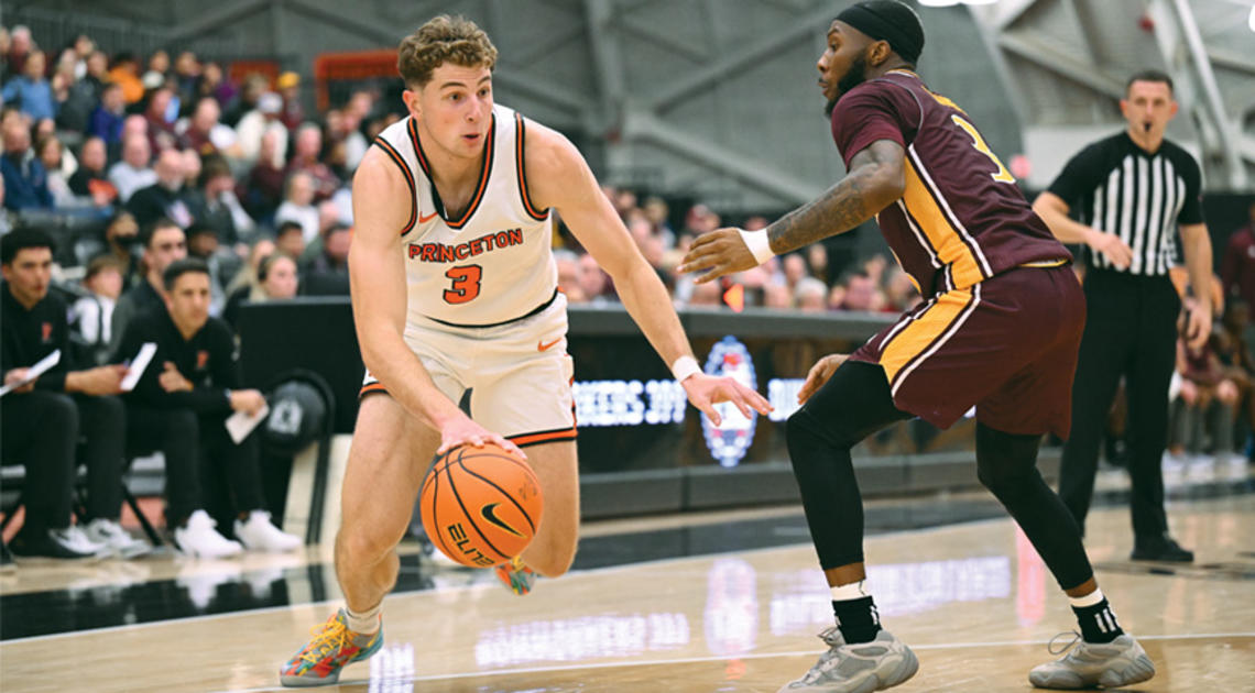 Caden Pierce ’26 drives to the basket against Iona Nov. 4, when he scored  18 points in Princeton’s comeback win.