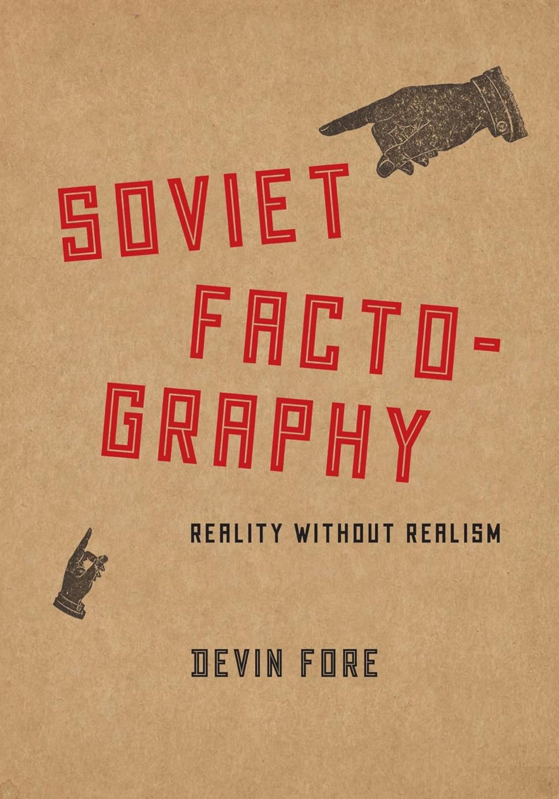 Book cover of Soviet Factography by Devin Fore which is brown with the title in red letters with hands pointing at the text.