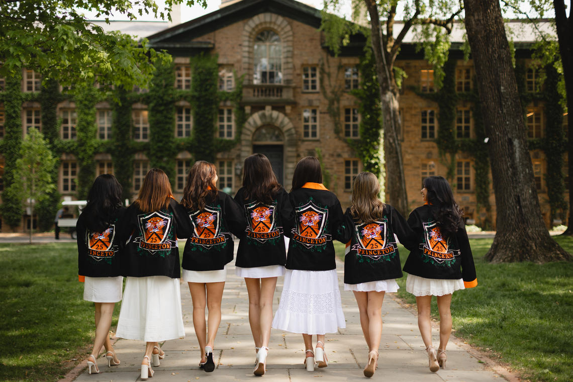 Jeanie-Chang-Jacket.jpg A group of Princeton women from the class of 2025 facing Nassau Hall while wearing their class jackets.