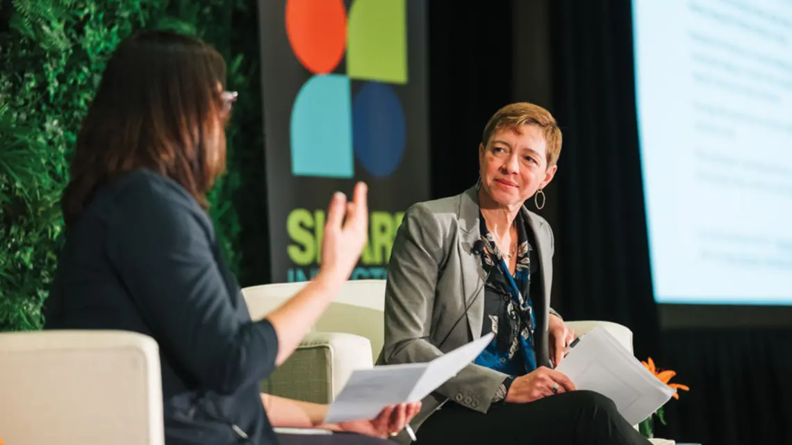 RESEARCH_Layne Mosley.jpg Layna Mosley on stage at the Share Investor Summit