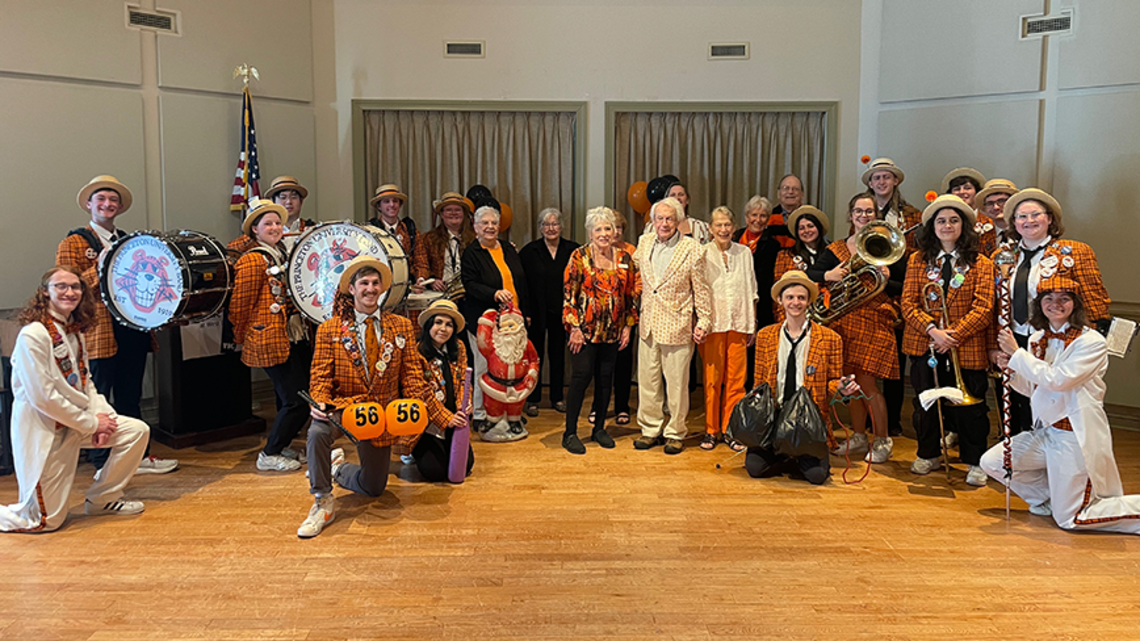 meeker-band-2025.png Band members and residents pose at a retirement community in New Jersey