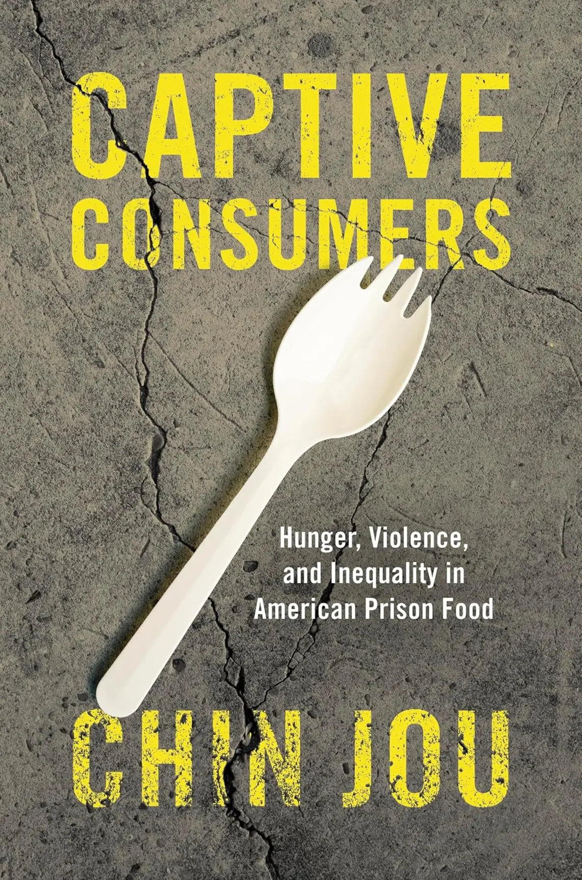 Captive-Consumers_Chin-Jou.jpg A spork on cracked concrete with the title surrounding it