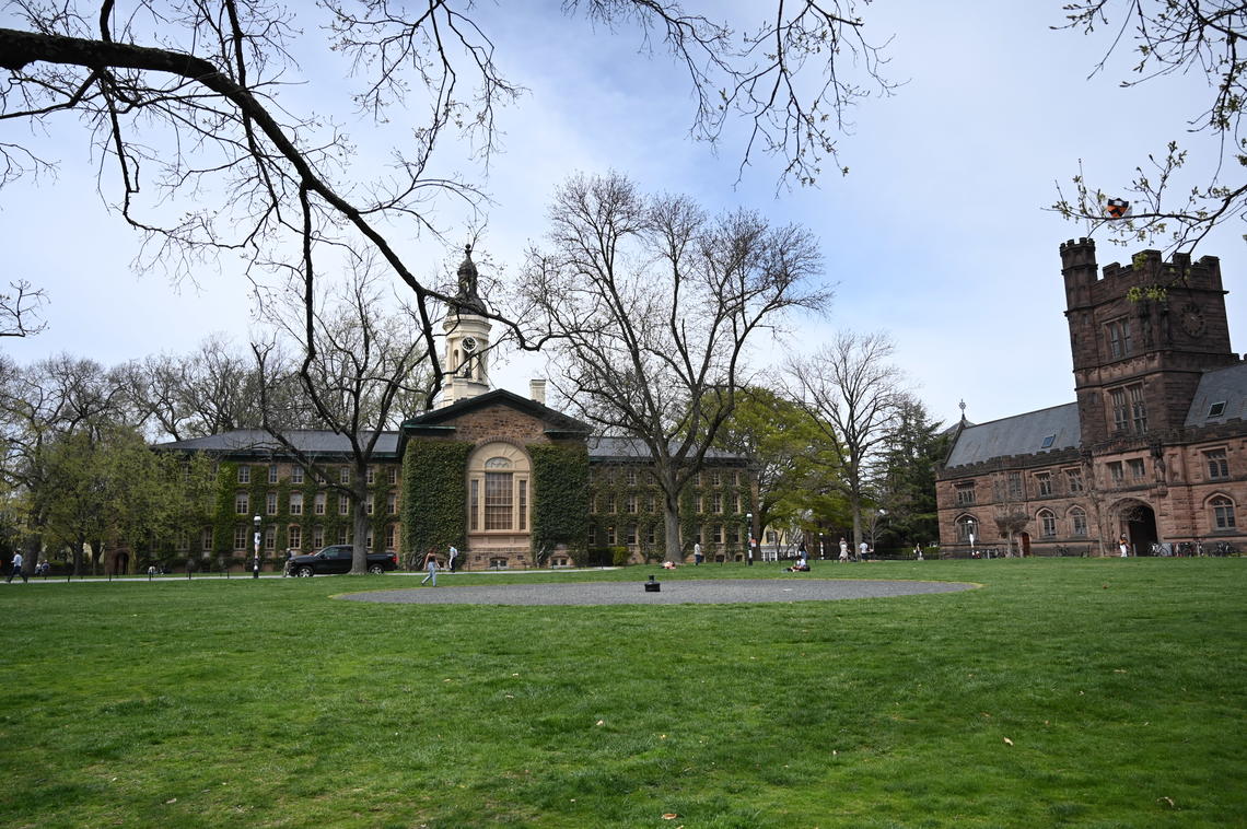 The back of Nassau Hall and one side of East Pyne, seen over Cannon Green.