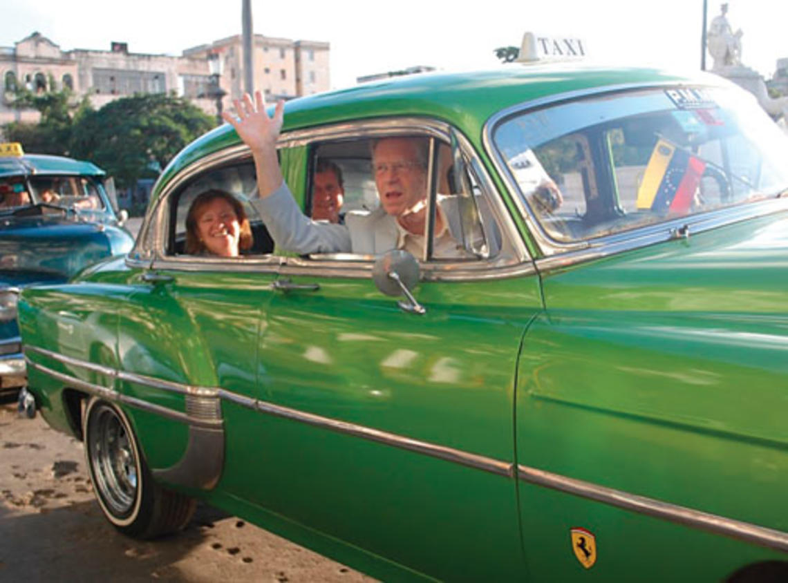 Frederick Hilles ’60, in the front seat, and in the back his wife, Jane Osgood, and Lee Fuller ’60 in Cuba last October. 