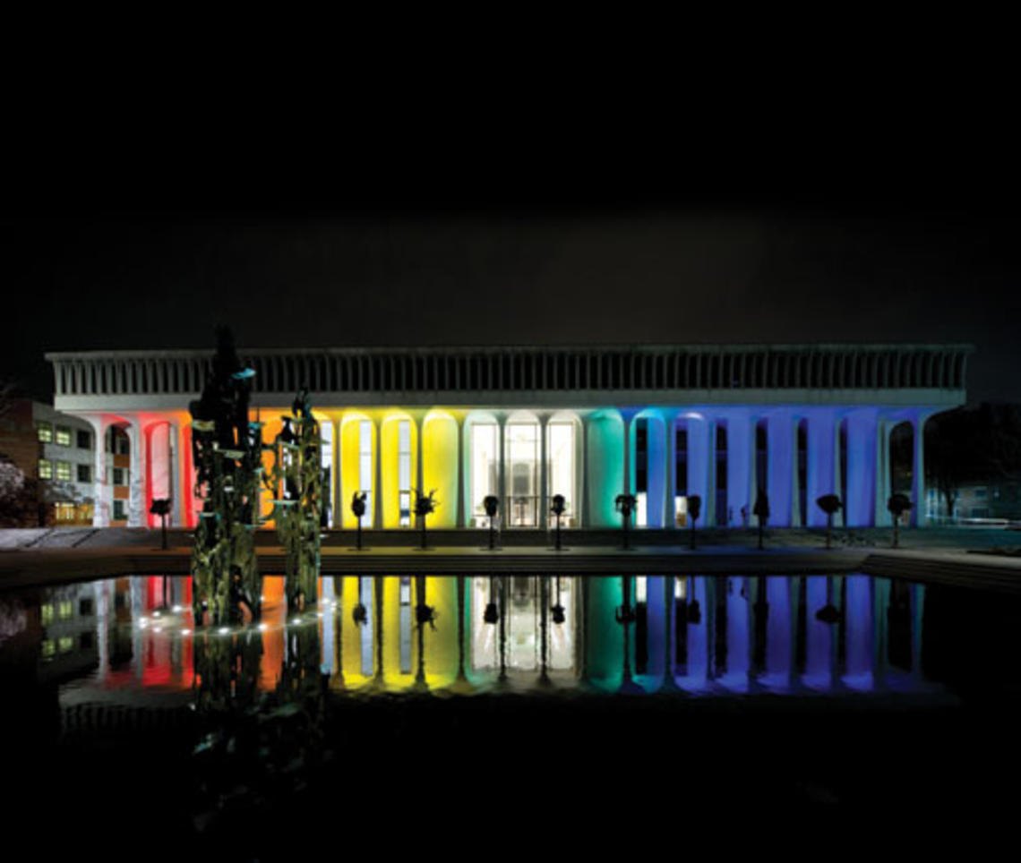 Robertson Hall at night during the “Every Voice” conference.