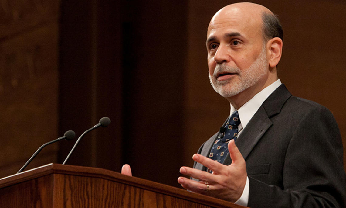 Ben Bernanke speaks at a podium.