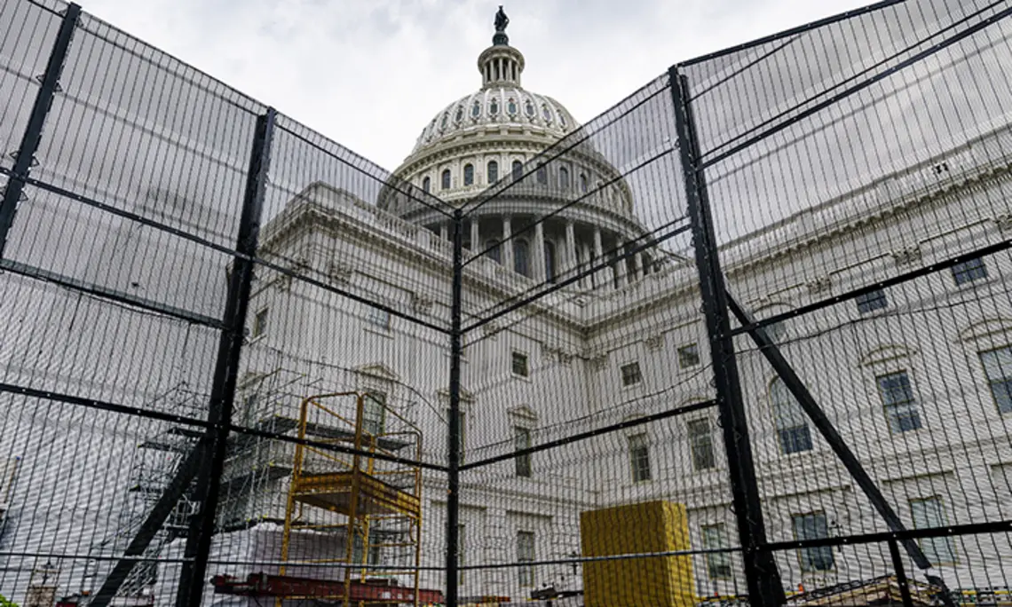 CapitolUnderConstruction.jpg Metal barricades surround the West Front of the Capitol building in Washington during an extensive repair, maintenance, and preservation project on July 29.