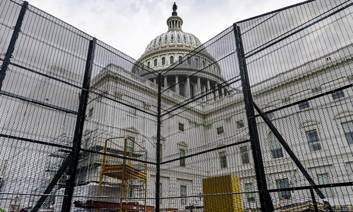 Metal barricades surround the West Front of the Capitol building in Washington during an extensive repair, maintenance, and preservation project on July 29.