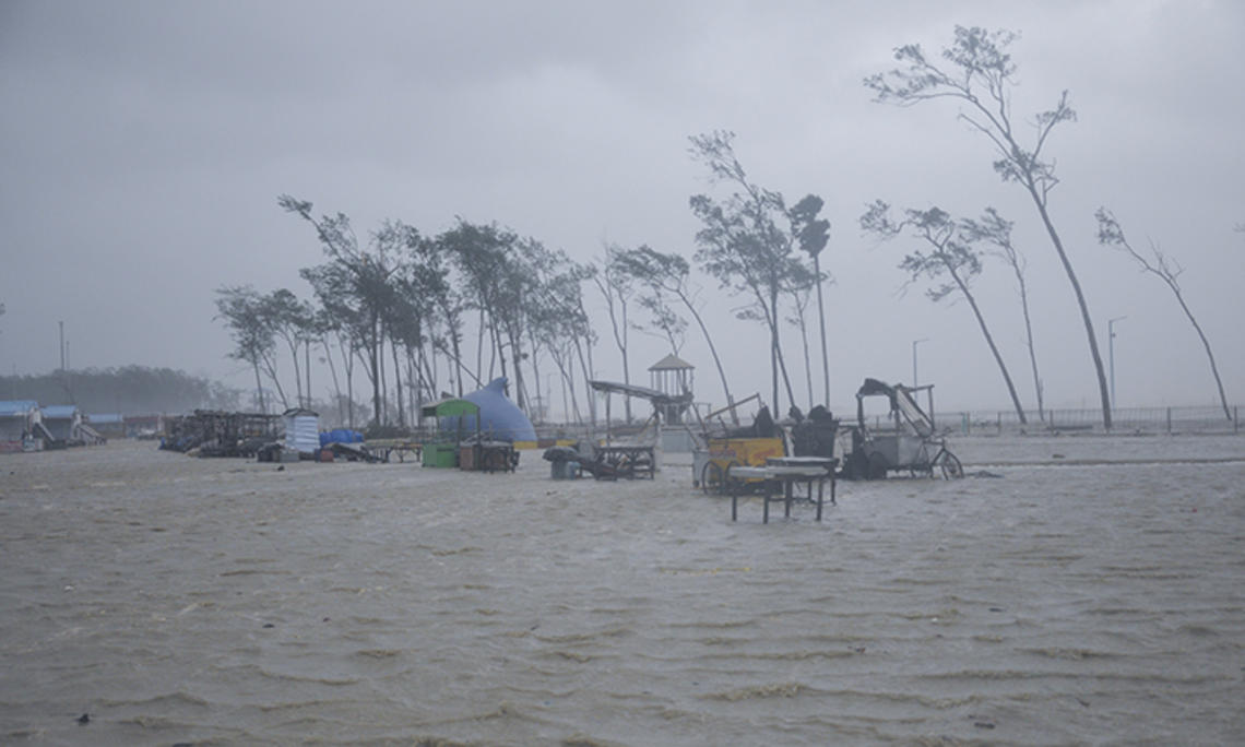 This is an AP photo of beach vendors’ kiosks surrounded by water during high tide at the Digha beach on the Bay of Bengal coast as Cyclone Yaas intensified on May 26, 2021.