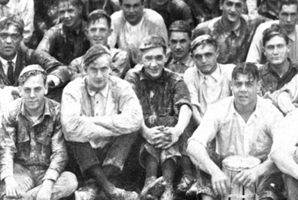 Ed_flourpic.jpg ’25 classmates in their “flour picture.”