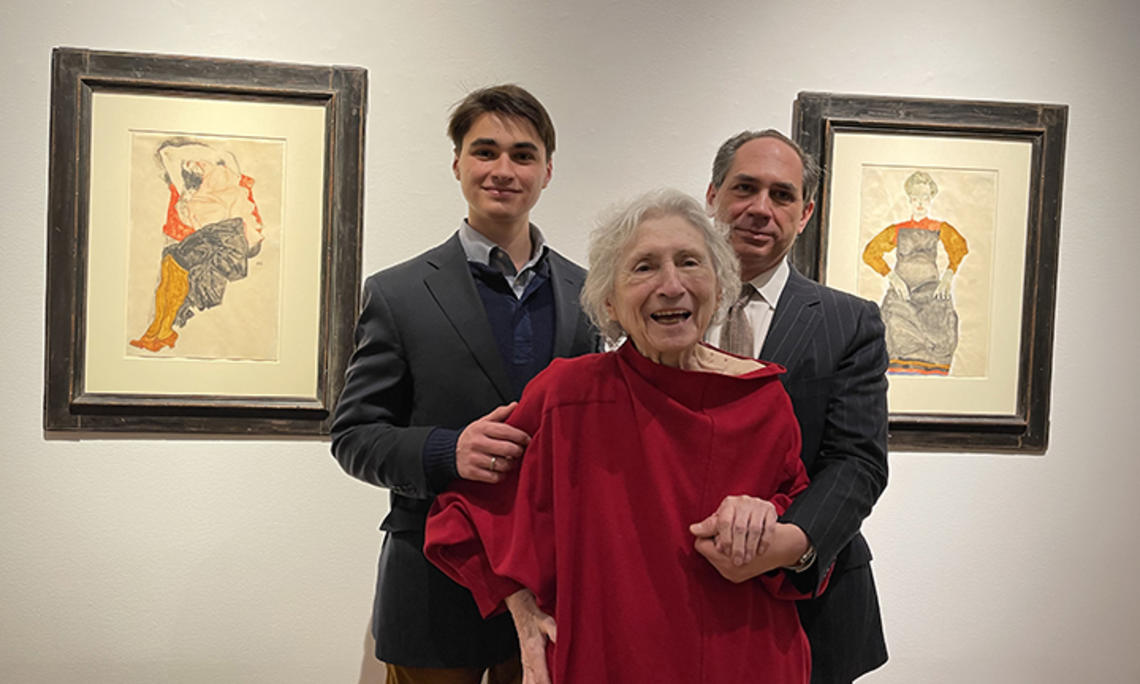 FFG.christies.2112.jpg Timothy Reif ’80 *85 with his son, Paul Reif, and his mother, Rita Reif, photographed at Christie’s in New York in December with the two paintings that were the subject of Reif v. Nagy.