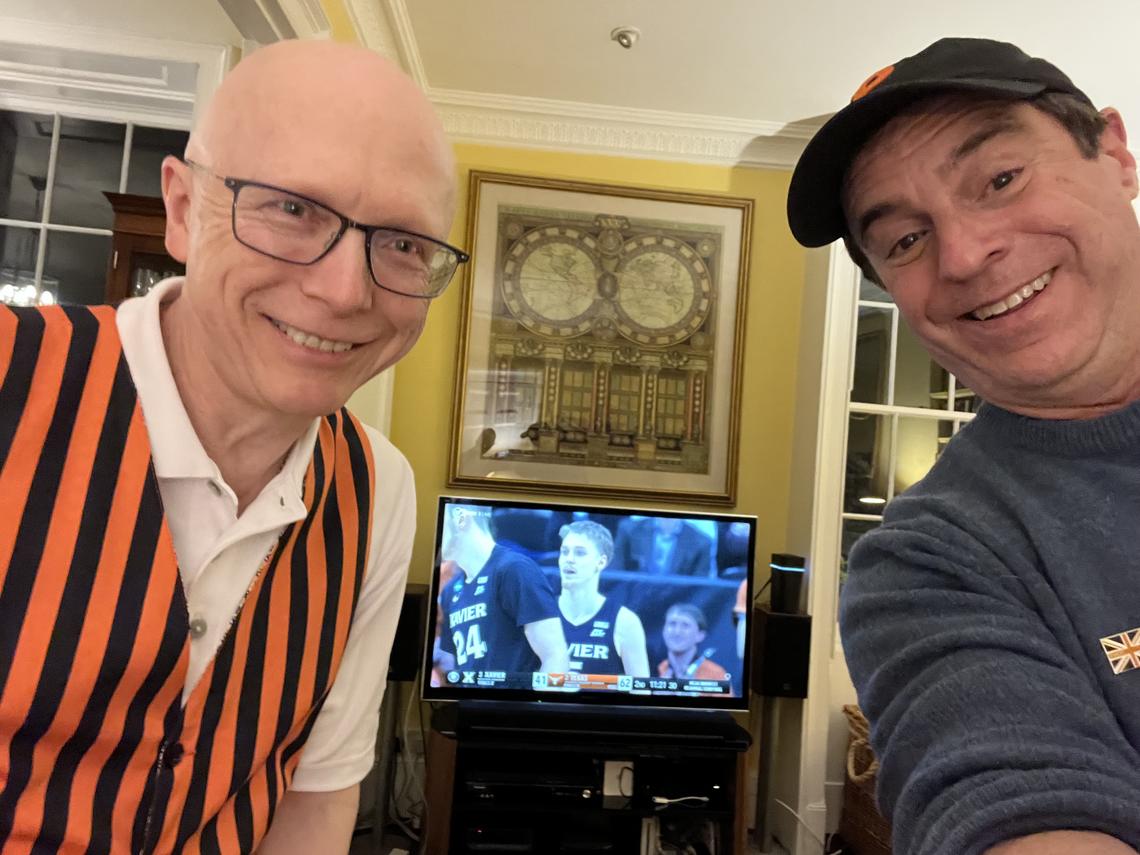 Dean Menegas ’83 and Mark F. Bernstein ’83 form a two-man Princeton watch party early Saturday morning in London.