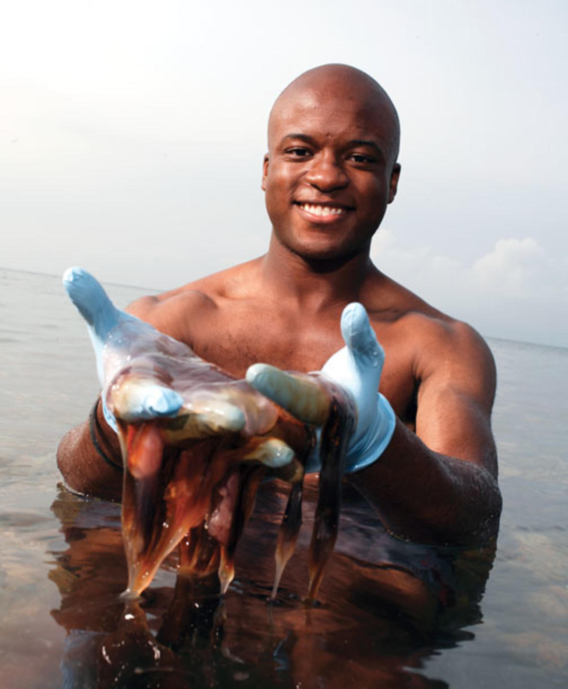 John Dabiri ’01 holds his source of inspiration: a jellyfish.