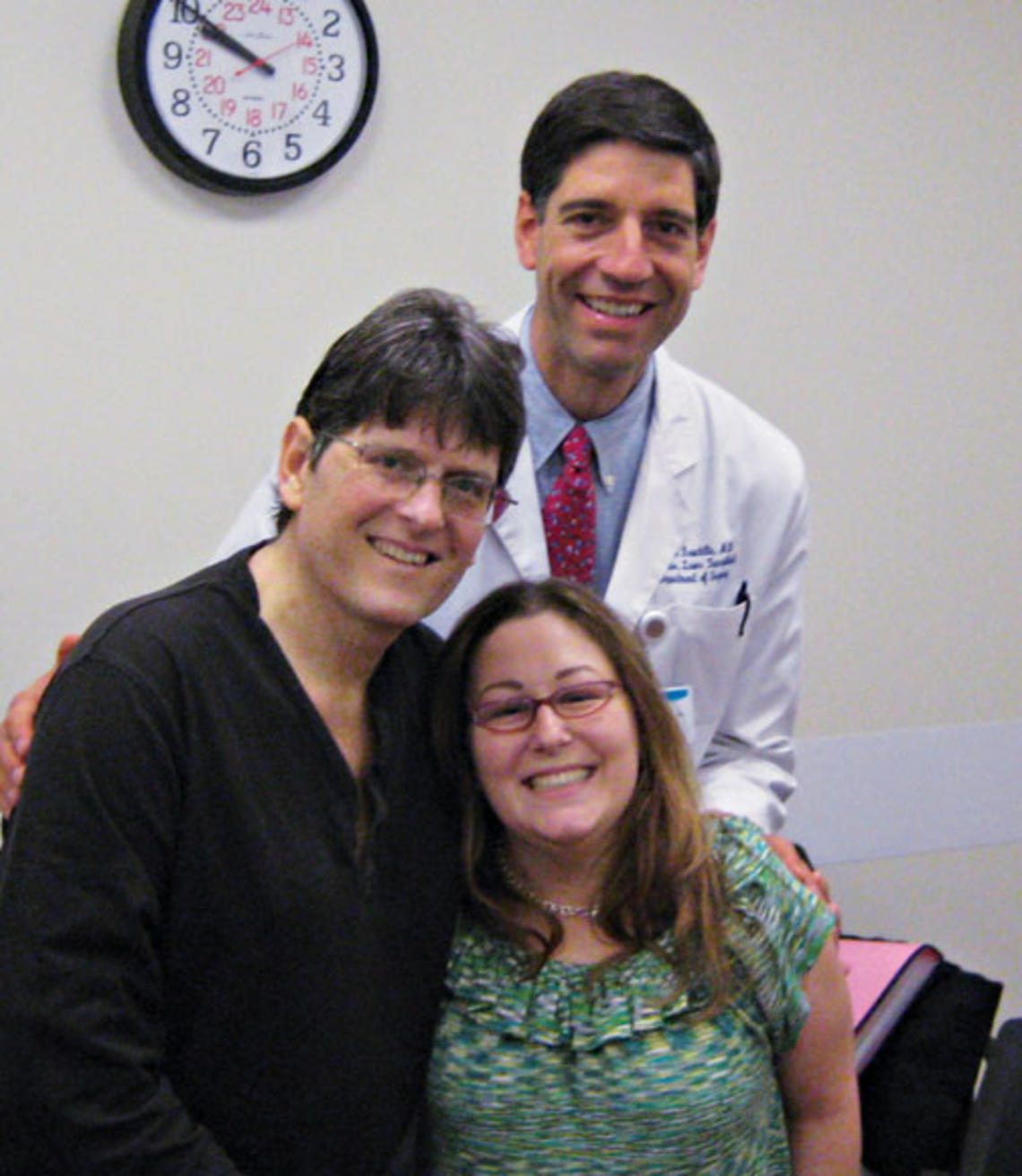 Bob Massie ’78, left, Dr. Stuart Knechtle ’78, and Jean Handler after the ­successful liver transplants.