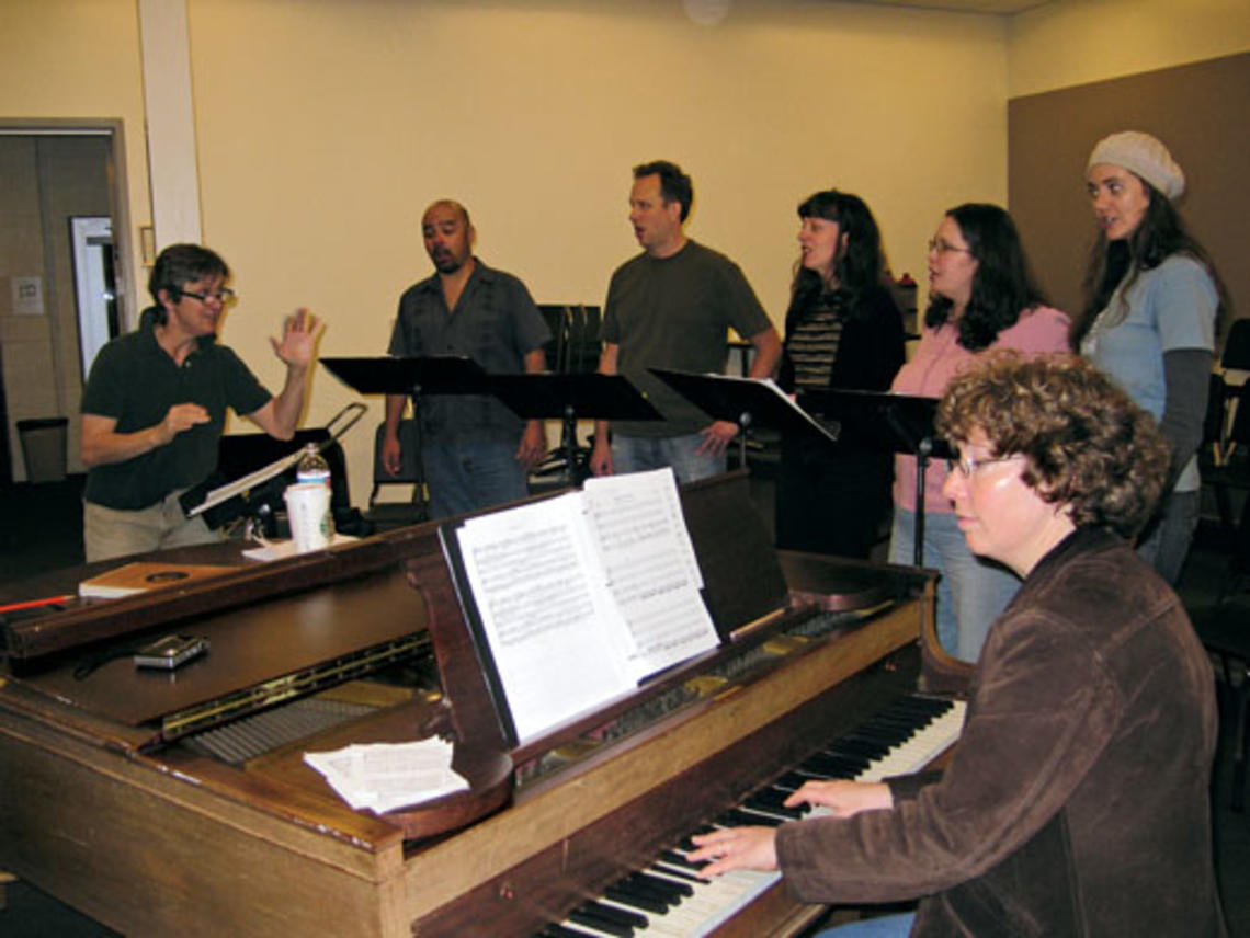 Lisa Scola Prosek '81 rehearses her latest opera, Trap Door, with vocalists.