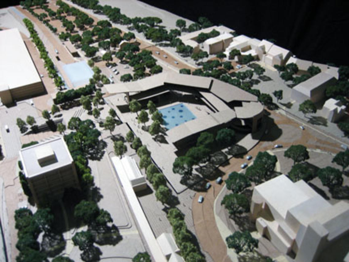 A model of three attached buildings that would provide performance, teaching, and office space for the arts. In the foreground are New South, left, and McCarter Theatre.