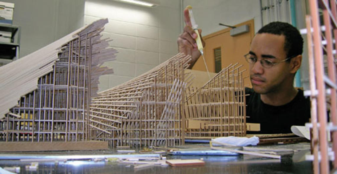  Sylvester Black ’09, above, glues the joints of the falsework for a model of Félix Candela’s Los Manatiales restaurant in Xochimilco, Mexico City.