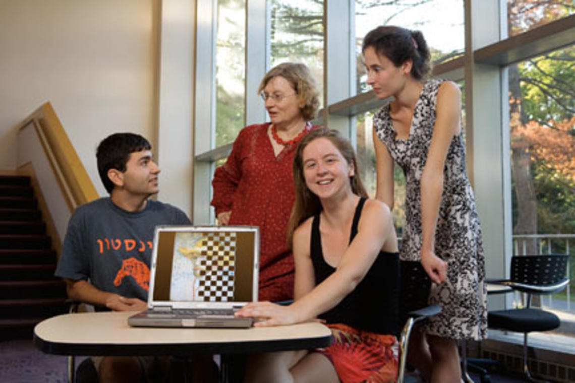 From left, graduate student Eugene Brevdo, math professor Ingrid Daubechies, and postdoc Shannon Hughes took part in a contest to identify which of six images of van Gogh paintings was a fake. Charlotte Caspers, far right, created the copy in the artistâ