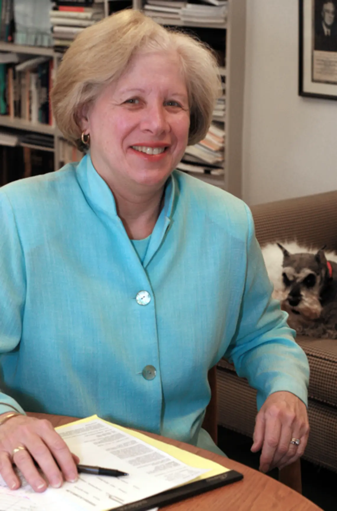 Nancy Weiss Malkiel, with Skipper behind her