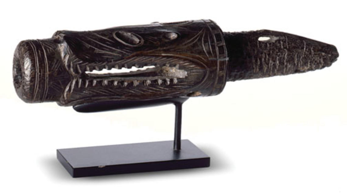 Part of a harpoon, carved from walrus ivory to suggest a predator of marine animals. The harpoon is believed to be from Alaska’s St. Lawrence Island.