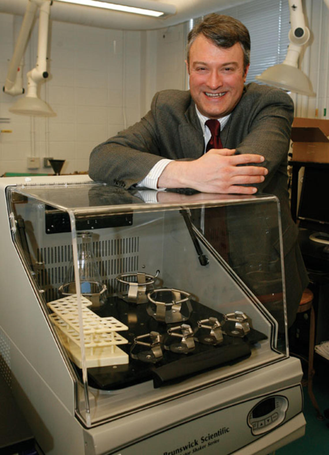 Professor Richard Register with an incubator, a common tool in bioengineering.