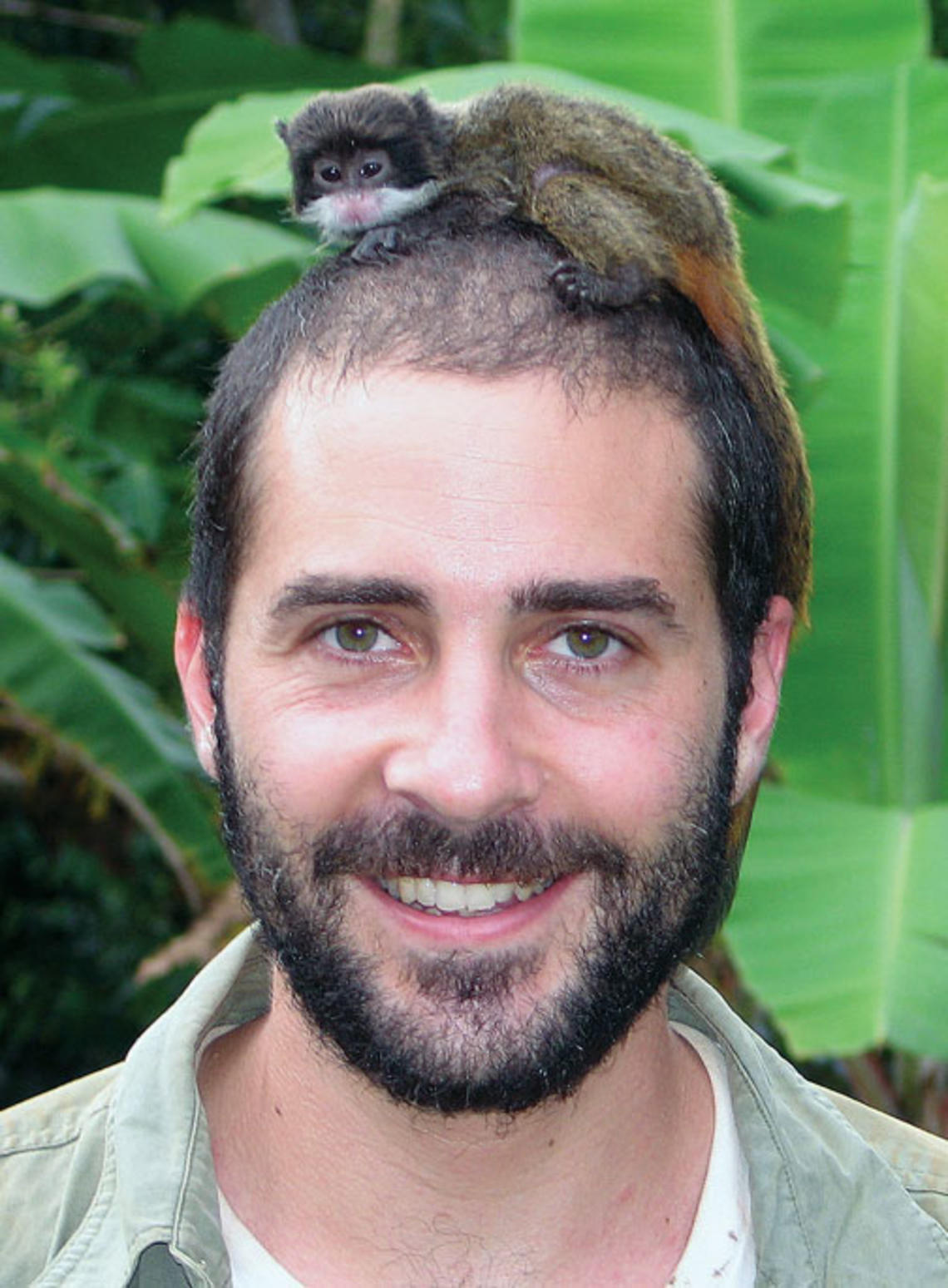The beetle Deltochilum valgum (below) feeds on millipedes instead of dung – a remarkable adaptation, according to Trond Larsen *06, shown with an emperor tamarin during a recent trip to Peru.