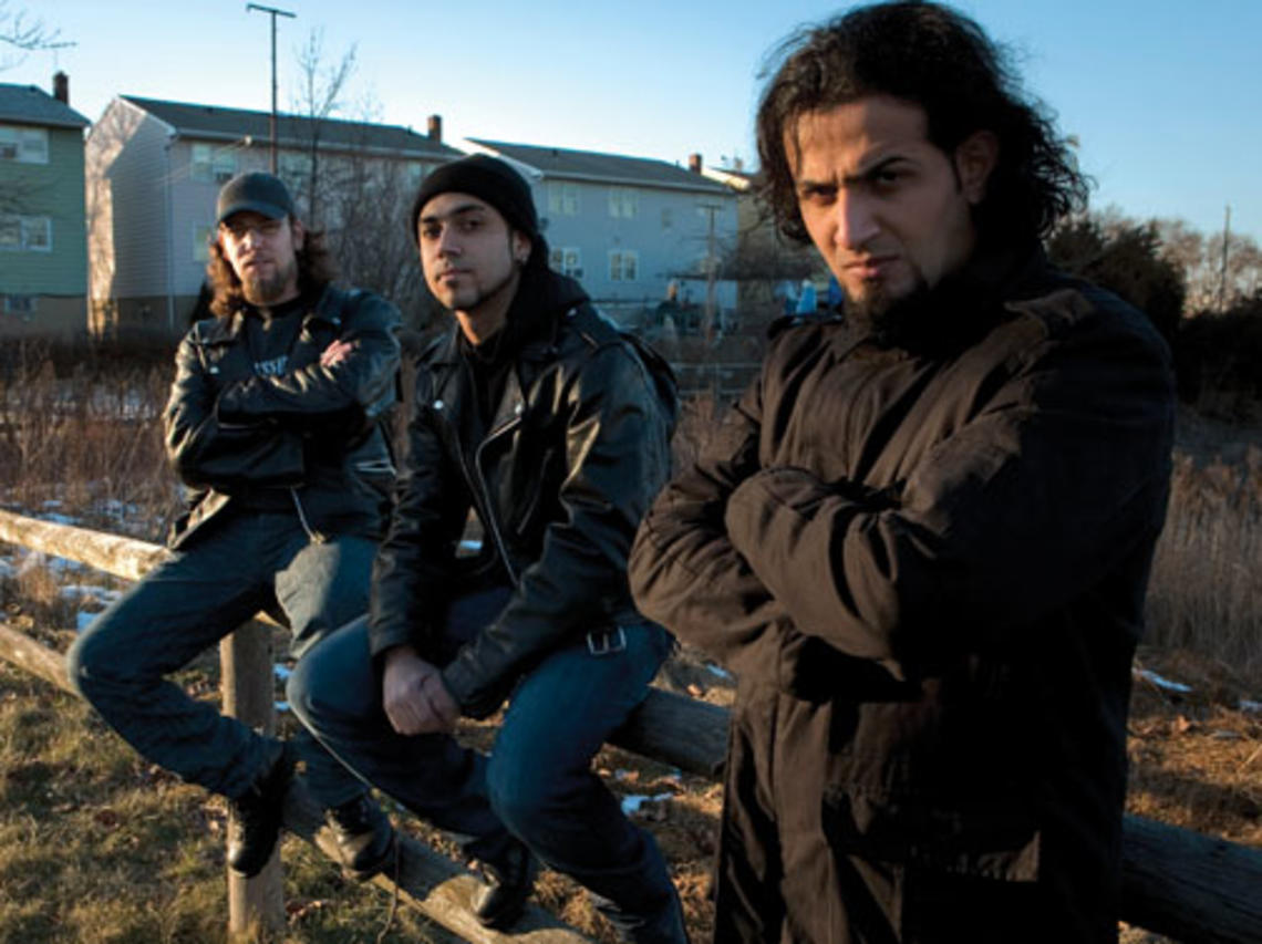 LIVE.Persp_11.jpg From left, Firas Al-Lateef, Faisal Talal, and Marwan Riyadh, members of the Iraqi heavy-metal band Acrassicauda, in Elizabeth, N.J., in February. A fourth member, Tony Aziz, is not pictured.