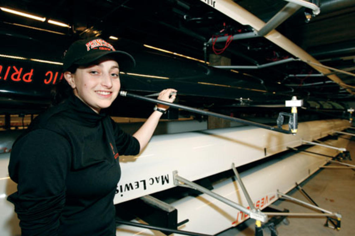 Erin Rosenbaum ’11, a coxswain for the men’s lightweights, wears reminders of two of her rowing forebears, grandfather Pete ’48 and great-grandfather Francis ’20, on her rowing cap.