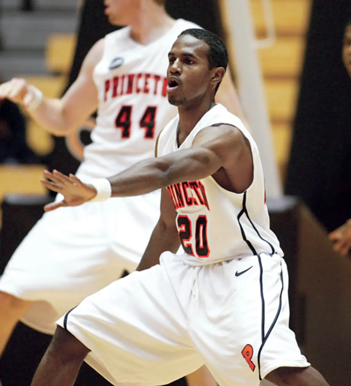 LIVE.SP_Davis_1.jpg High-scoring guard Douglas Davis ’12, center, has improved as a defender.