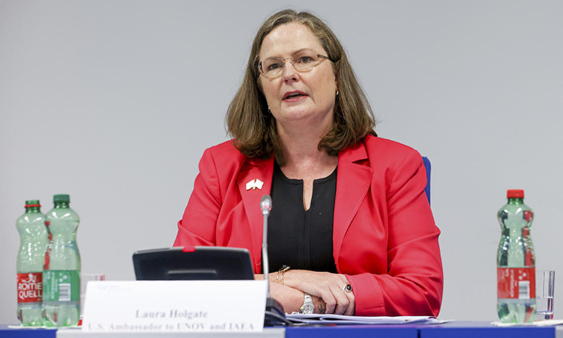 LauraHolgate.jpg This is a photo of Laura Colgate sitting at a table and talking.
