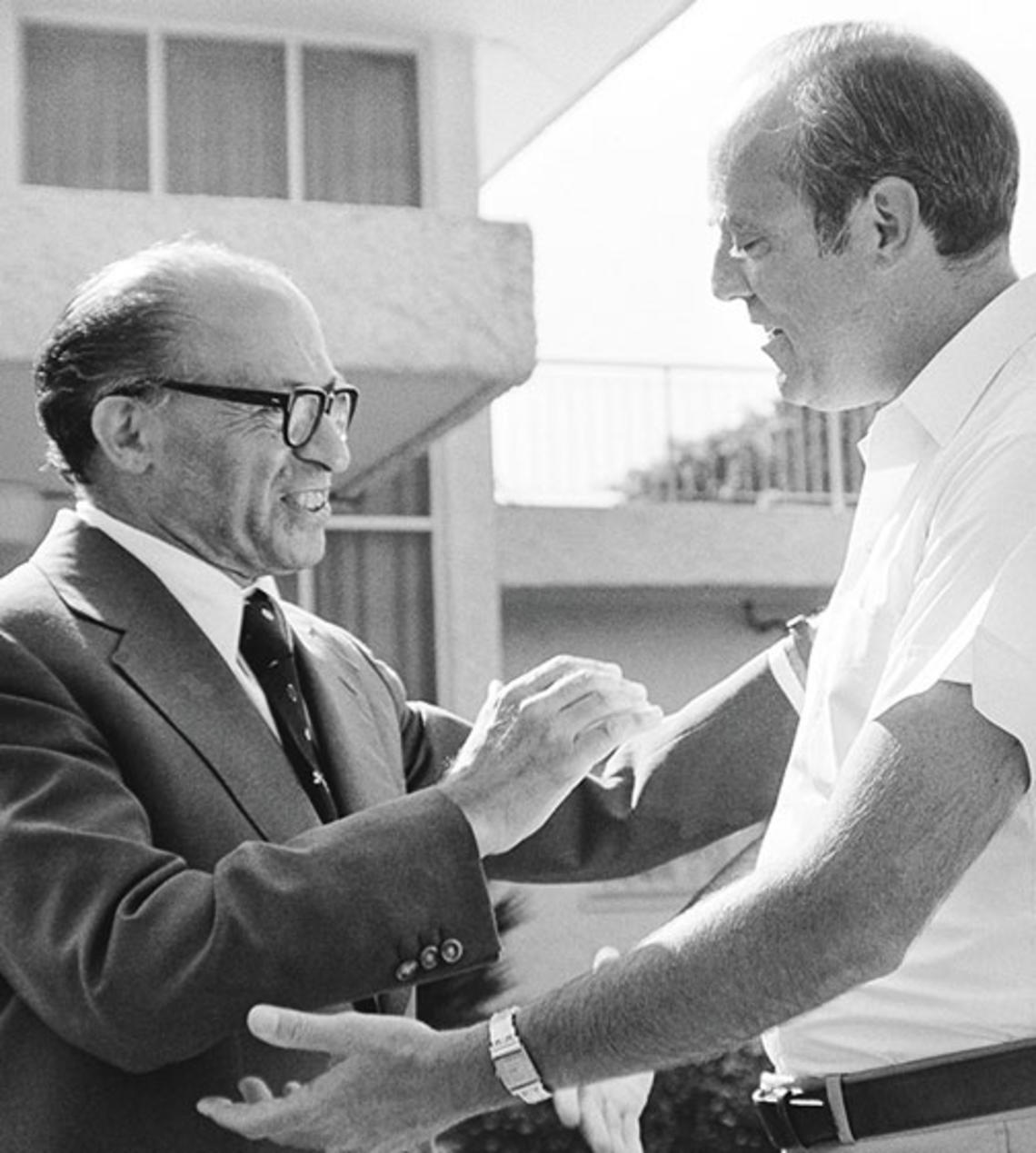 Samuel W. Lewis *64, right, with soon-to-be Israeli prime minister Menachem Begin.