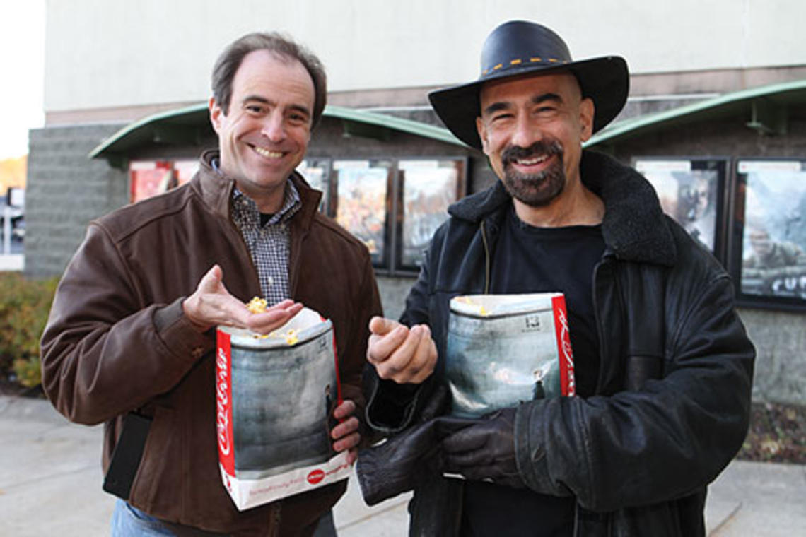 PAW senior writer Mark F. Bernstein ’83, left, and astrophysics professor David Spergel ’82 discuss the science in Interstellar.