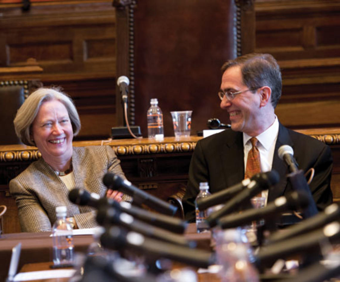 President Tilghman and the man chosen to be her successor, Provost Christopher Eisgruber ’83, share a laugh during a Nassau Hall press conference April 21. 