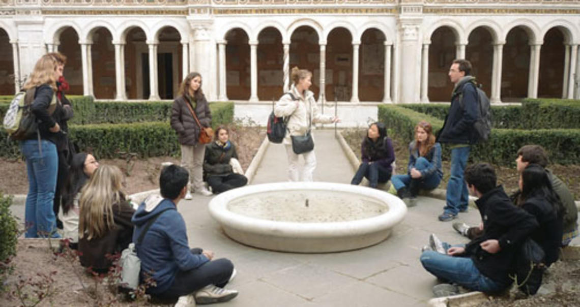 Participants in a 2010 freshman seminar funded by the Class of 1972 visit the cloister of San Paolo fuori le Mura in Rome.