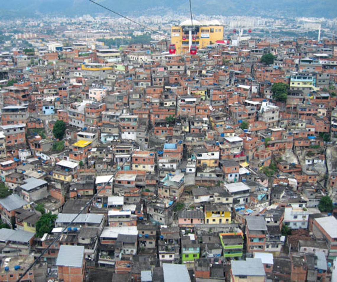 A view of Complexo do Alemão, a shanty town in northern Rio de Janeiro, from a tram used by residents and tourists. Hank Song '11, left, visited some of Brazil’s poorest ­neighborhoods as a Princeton in Latin America fellow last year.