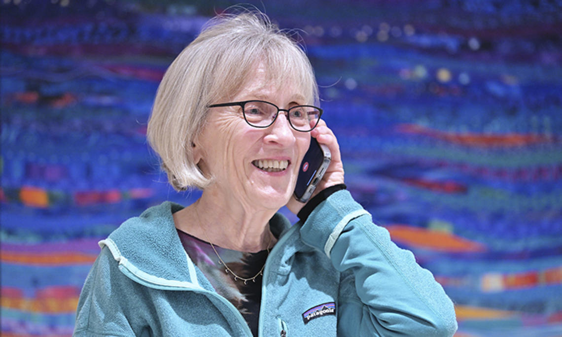 Harvard professor Claudia Goldin speaks to a reporter on the phone in her home in Cambridge, Massachusetts, after learning that she received the Nobel Prize in economics on Monday.