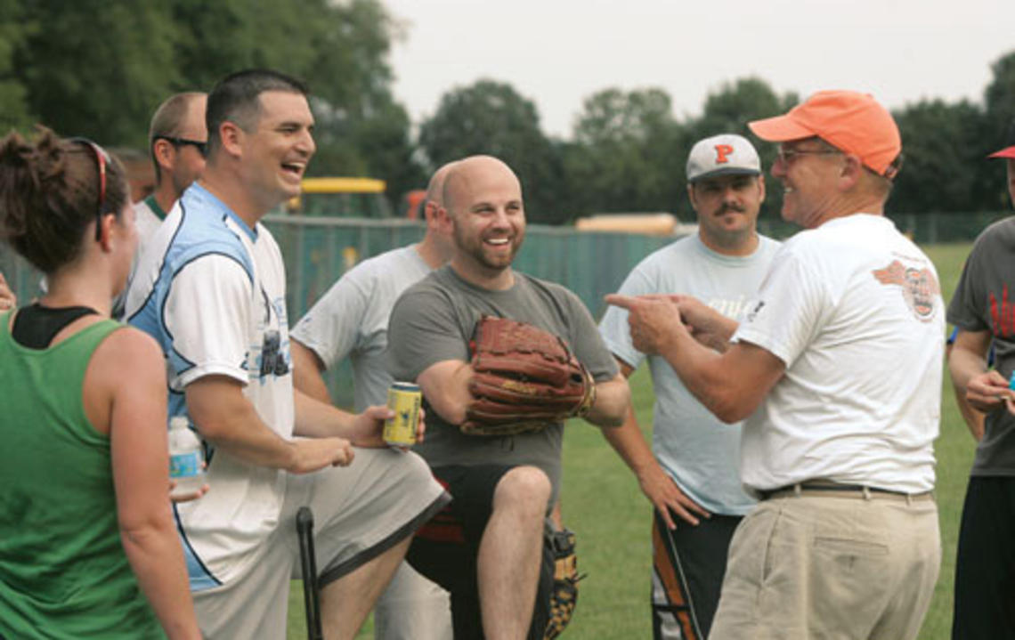 Professor Alain Kornhauser *71, far right, is Mr. Summer Softball. He says that alumni stop him in airports to chat about the league, years after they’ve left Princeton.