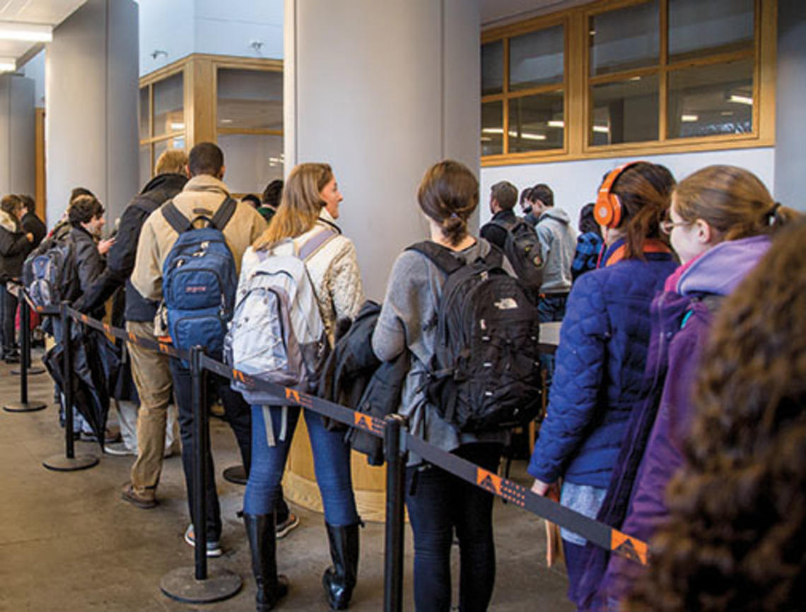 Students line up in Frist Campus Center to receive the meningitis B vaccine.