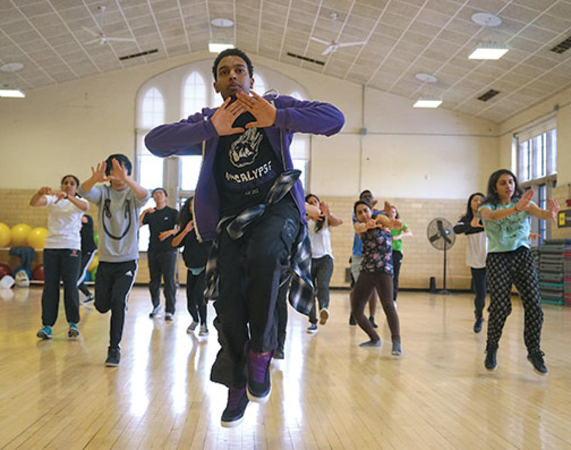 Don Wilson ’15, of the Black Arts Company: Dance, leads students in a hip-hop routine.