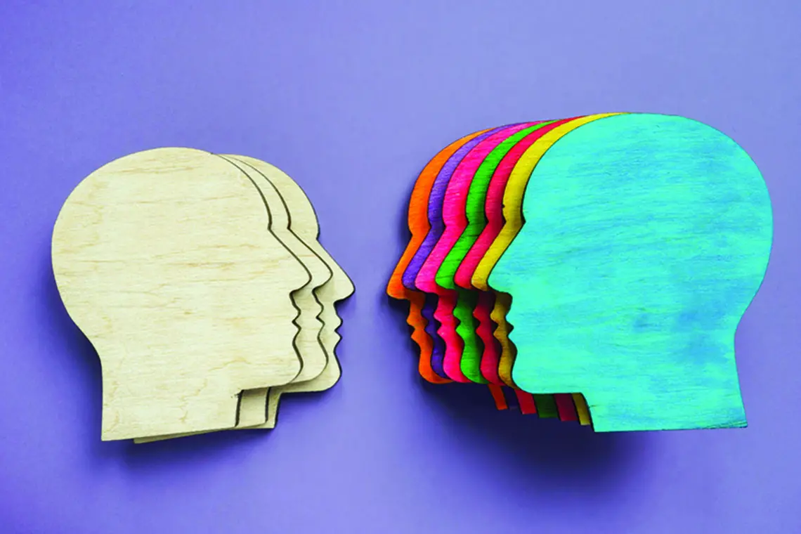 Graphic illustrating diversity using differently colored heads