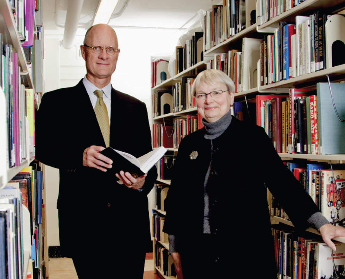  Librarian Karin Trainer (right) and University Architect Ron McCoy *80 review new shelving planned for Firestone Library as part of its forthcoming renovation.  